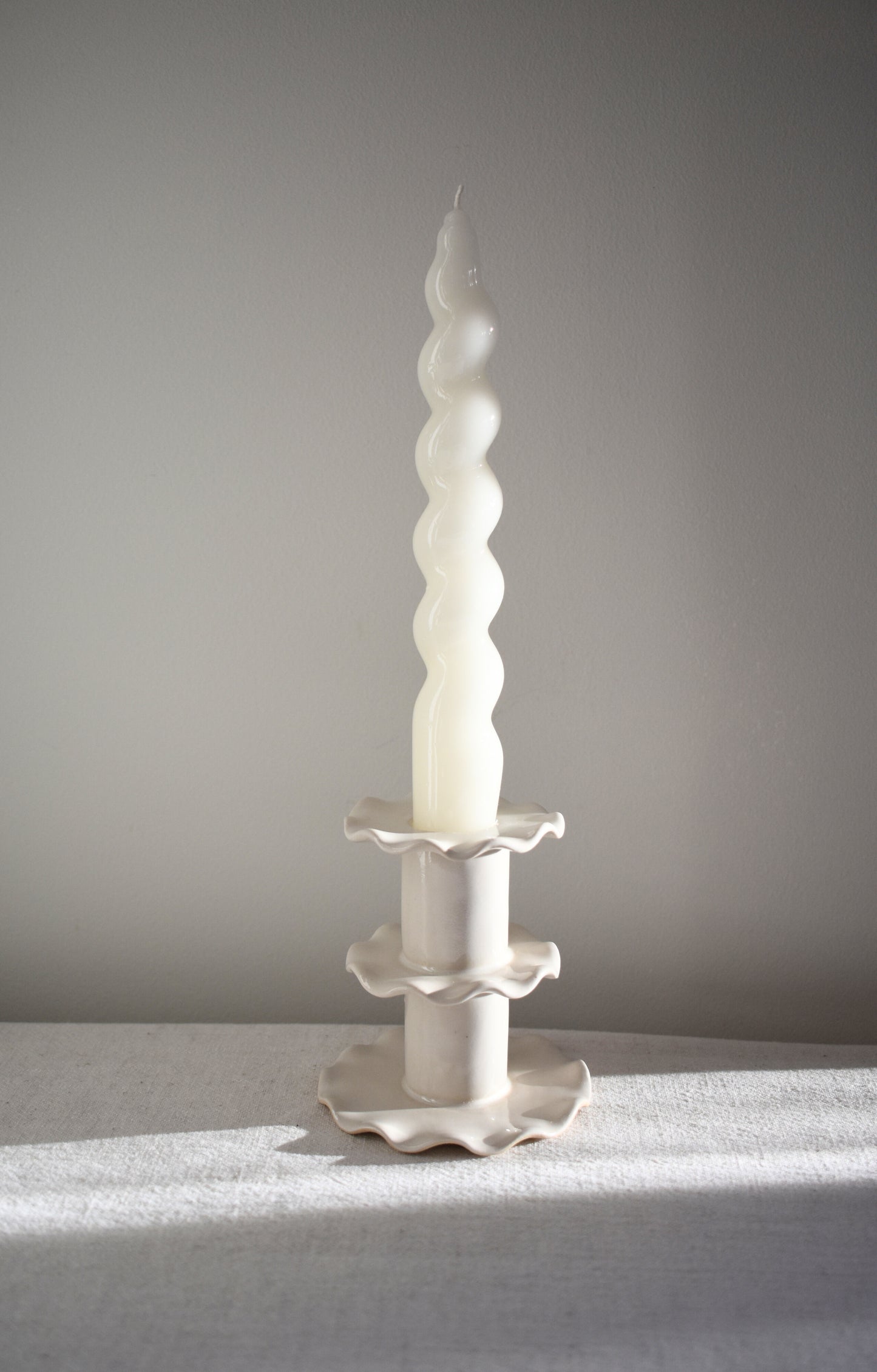 Superfluities stoneware ceramic Medium Frill Candlestick in white.