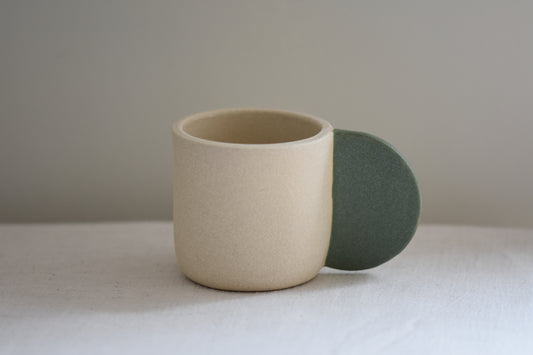 Brutes ceramics stoneware medium signature mug in textured finish with granite green glazed handle.