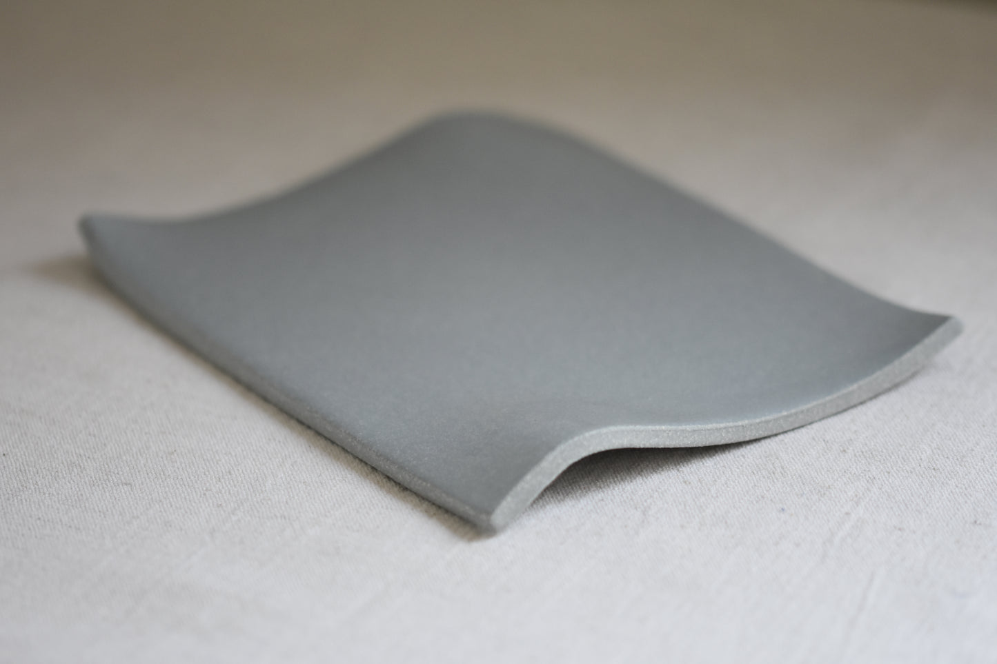 Brutes ceramics small stoneware rumpled wavy platter in pale blue.