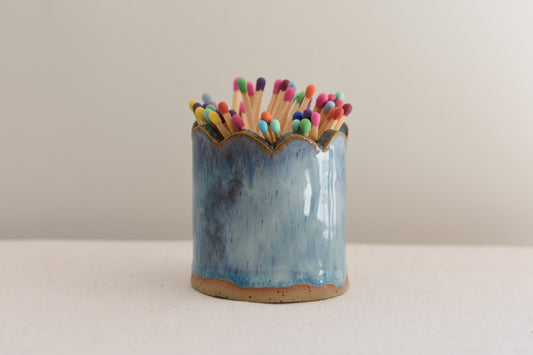 Blume Ceramics stoneware matchstick holder, glazed in blue, with scalloped top and multicolour matches.