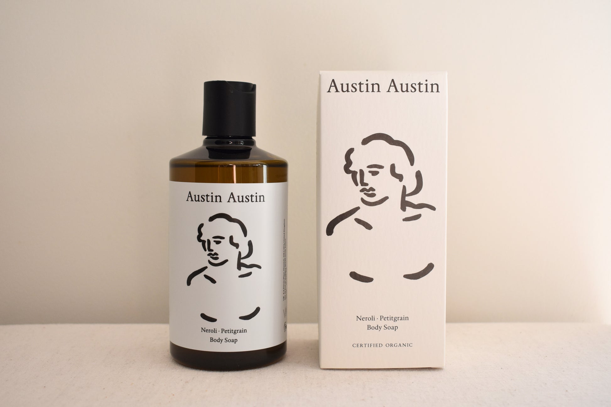 Austin Austin Organic body soap with body outline artwork on the bottle and box.