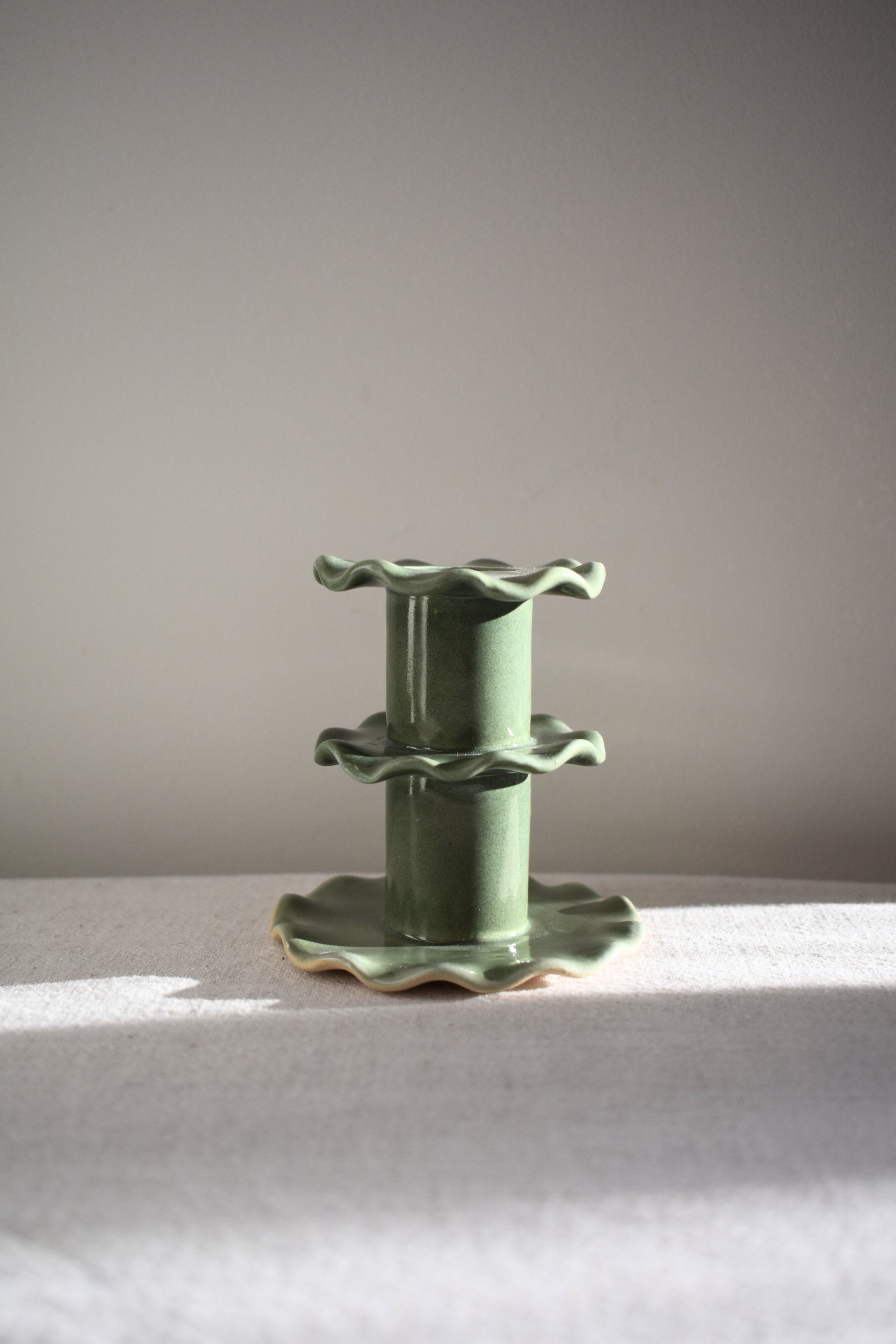 Superfluities stoneware ceramic Medium Frill Candlestick in green.