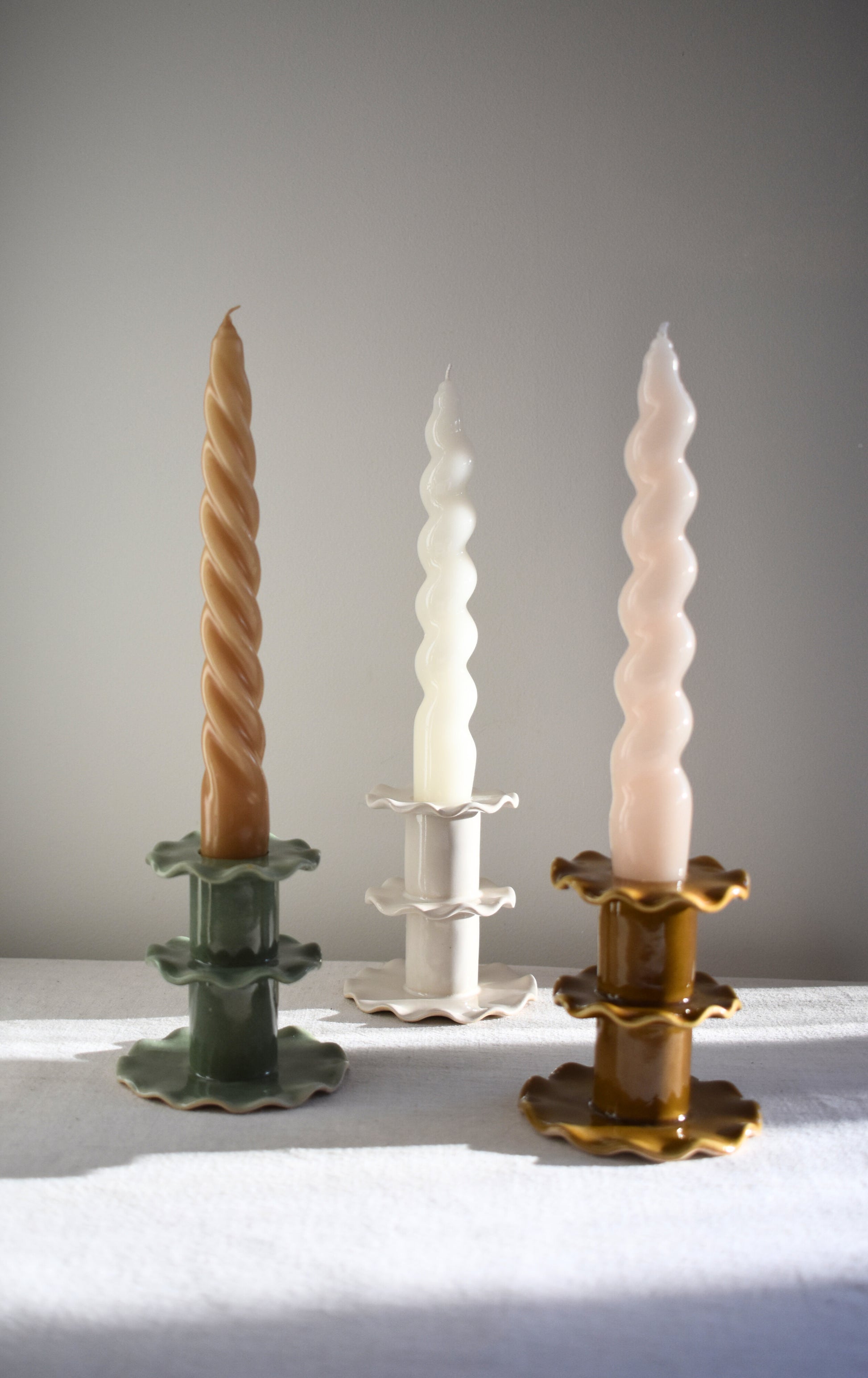 Superfluities stoneware ceramic Medium Frill Candlesticks in green, white and honey ochre.