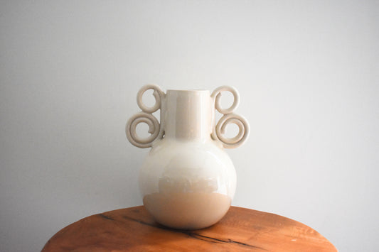 We Are Clay Celtic Spiral Vase in white ceramic with spiral handles.