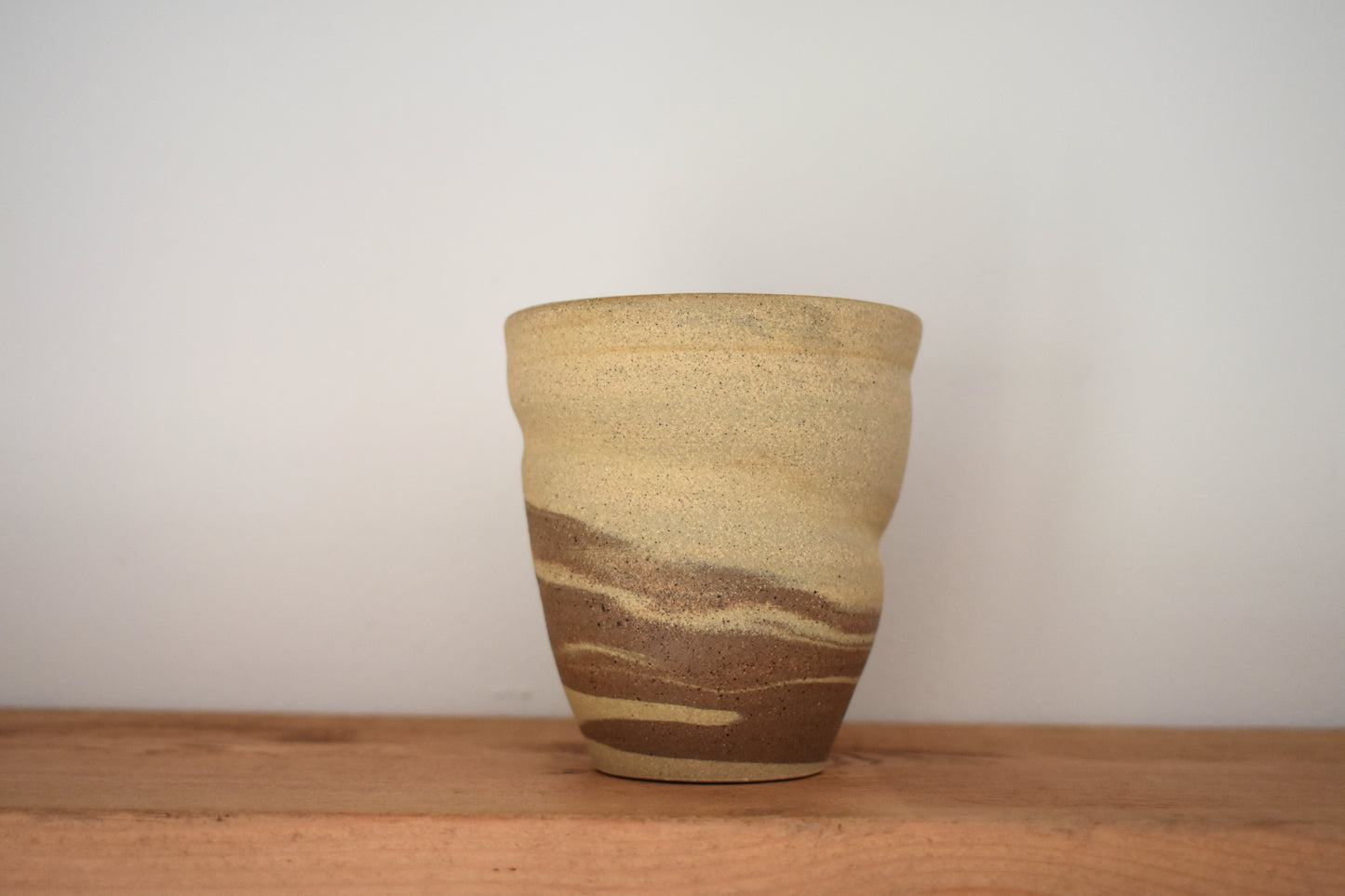 Ceramics by Sunny stoneware spiral cup with beige and brown marble pattern. 