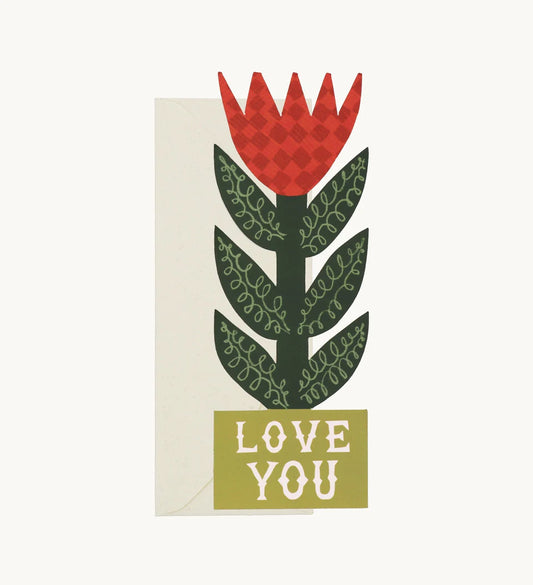 Hadley Paper Goods Checkerboard lily card featuring a stand up red and green flower and love you message with an ivory envelope, on a white background.