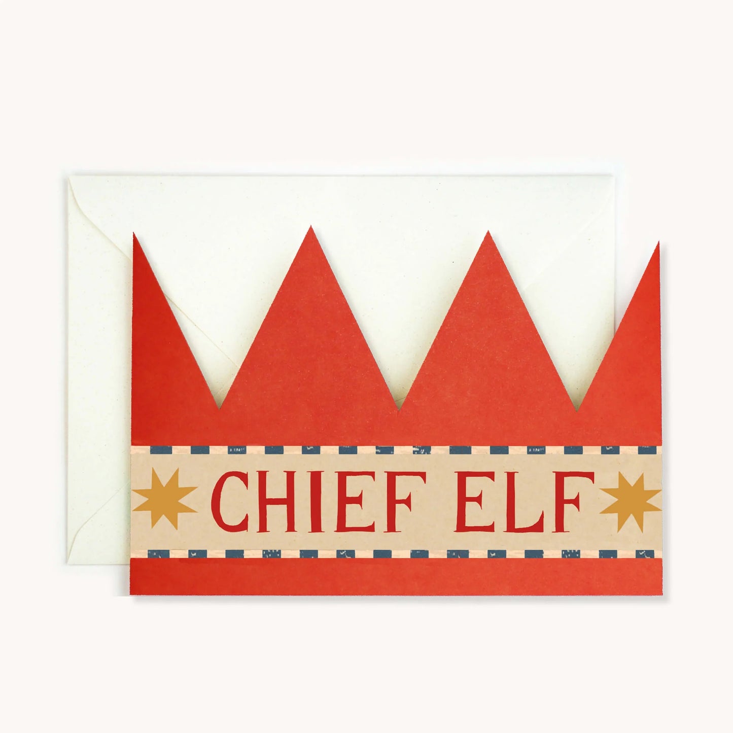 Hadley Paper Goods Chief Elf party hat crown shaped card in orange with blue pattern and yellow stars, and ivory envelope, on a white background.