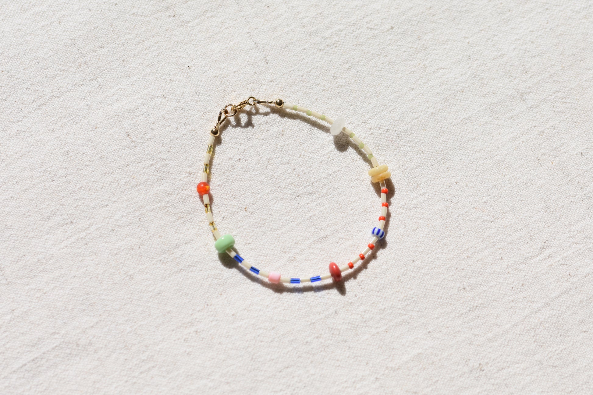 By my hands Little Bracelet with multicoloured Miyuki and Toho seed beads and gold-filled fastenings.