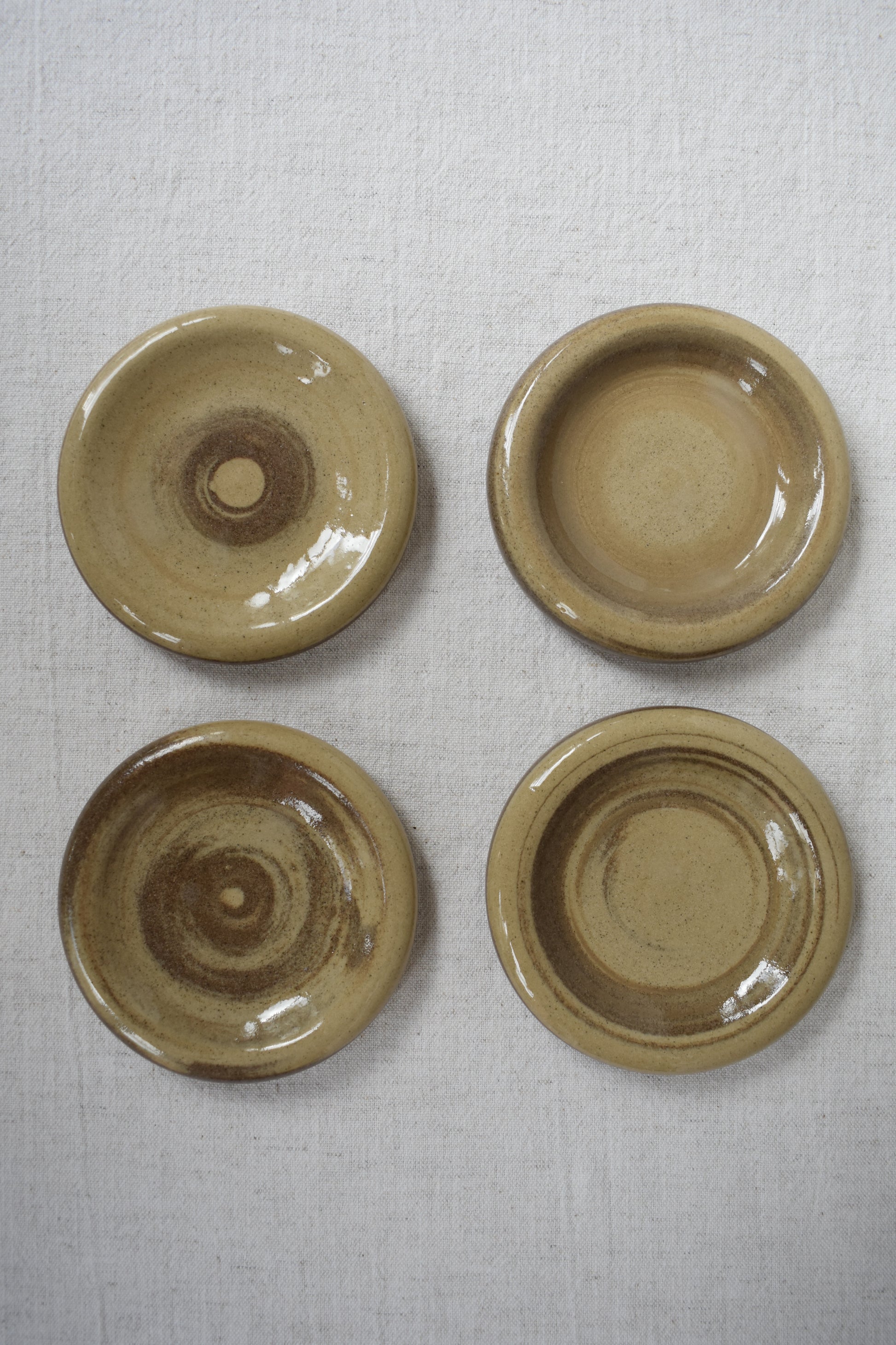 Ceramics by Sunny small stoneware doughnut shaped plates or coasters with marble pattern.