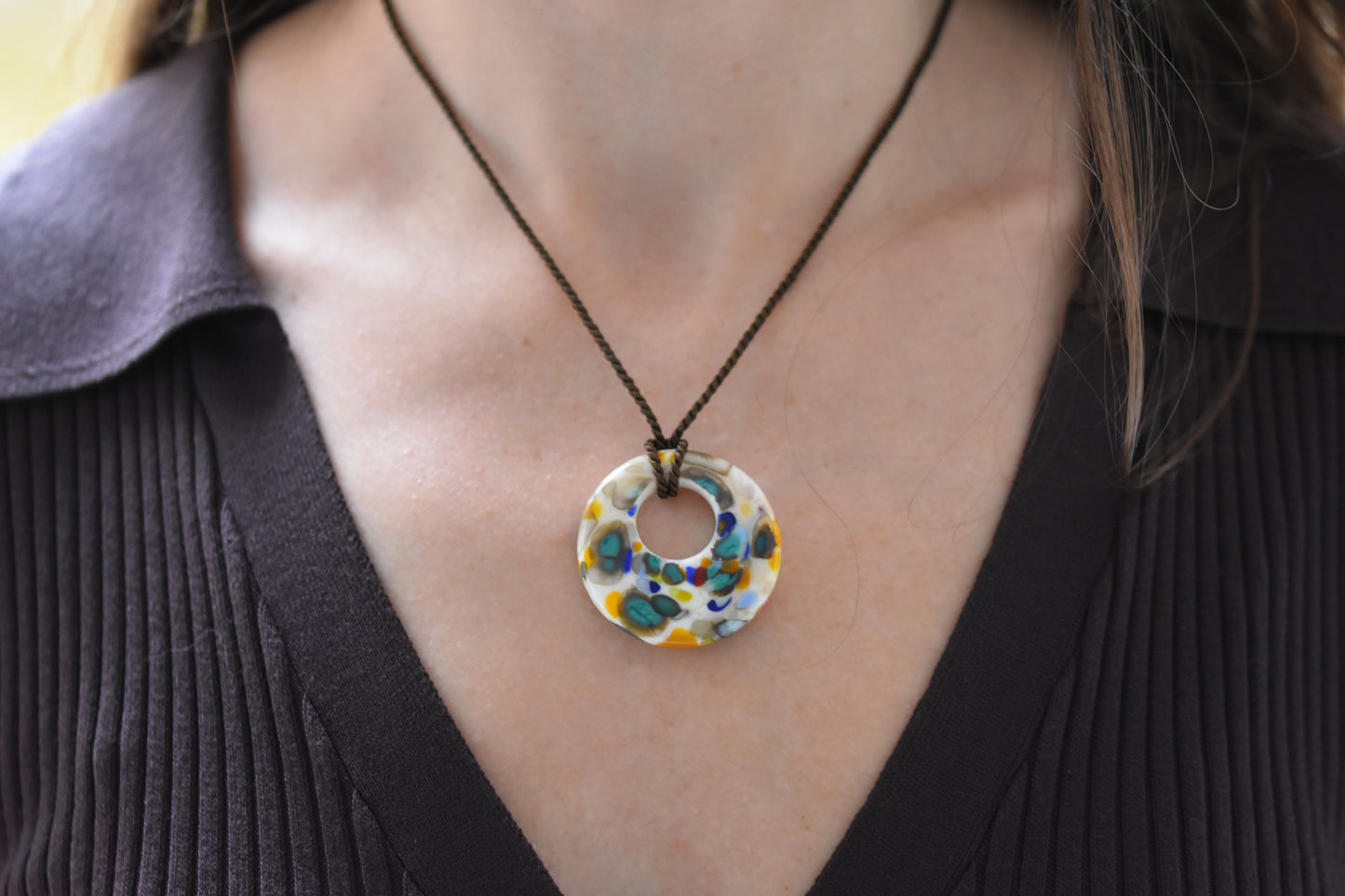 Sandralexandra Zero Waste multicolour glass disc on brown twisted silk cord necklace.