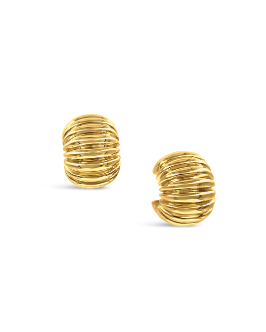 Daphine Clara gold chunky ribbed hoop earrings.