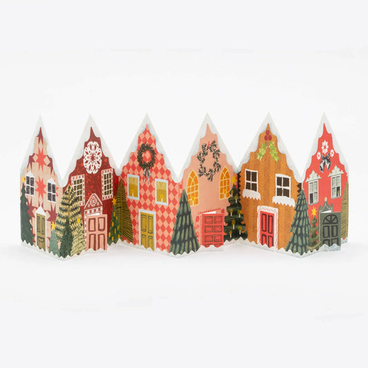 Hadley Paper Goods Concertina Christmas houses card, showing 6 decorative houses in shades of red and green, on a white background.