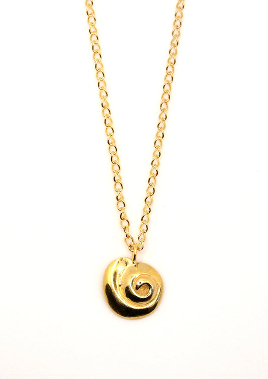 Hannah Bourn Periwinkle necklace with spiral swirl shell pendant on a chain in gold.