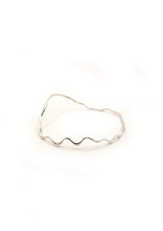 Hannah Bourn Saccostrea wavy bangle in silver.