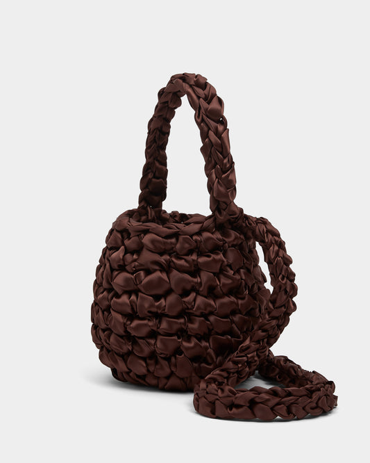 Isla de Gar brown satin ribbon crochet bag, with handle and crossbody strap on a white background.