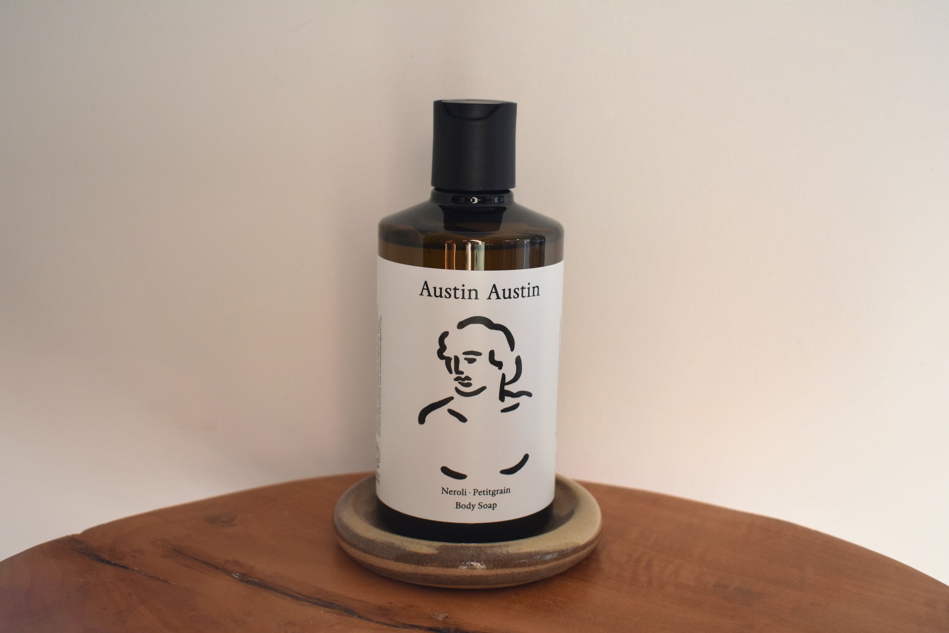 Austin Austin Organic body soap with body outline artwork on the bottle.