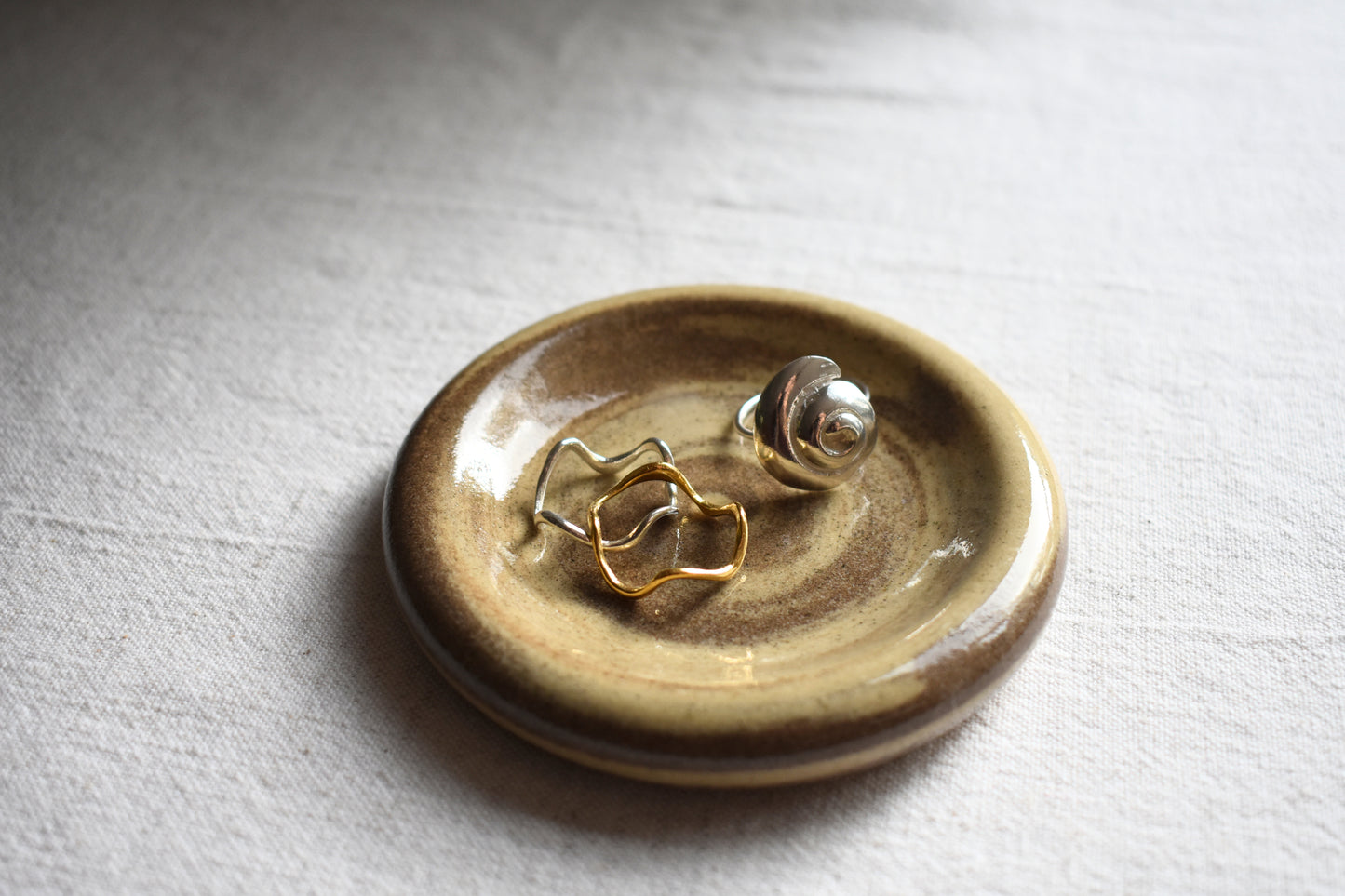 Ceramics by Sunny small stoneware doughnut shaped jewellery dish with marble pattern.