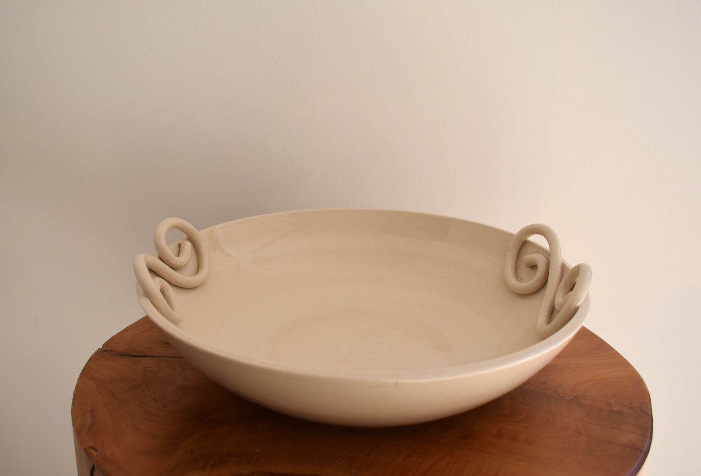 We Are Clay Pretzel fruit bowl in white ceramic with spiral design.